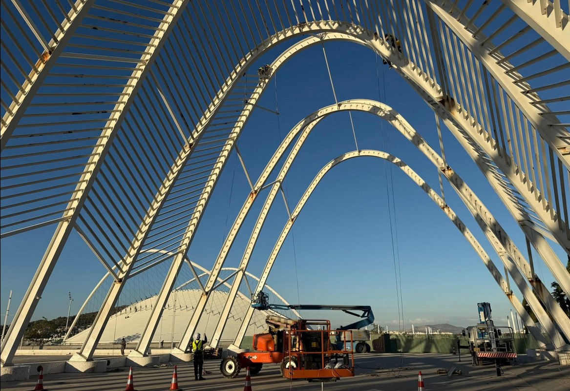 Σε εξέλιξη οι εργασίες αποκατάστασης των εμβληματικών κατασκευών Καλατράβα στο ΟΑΚΑ